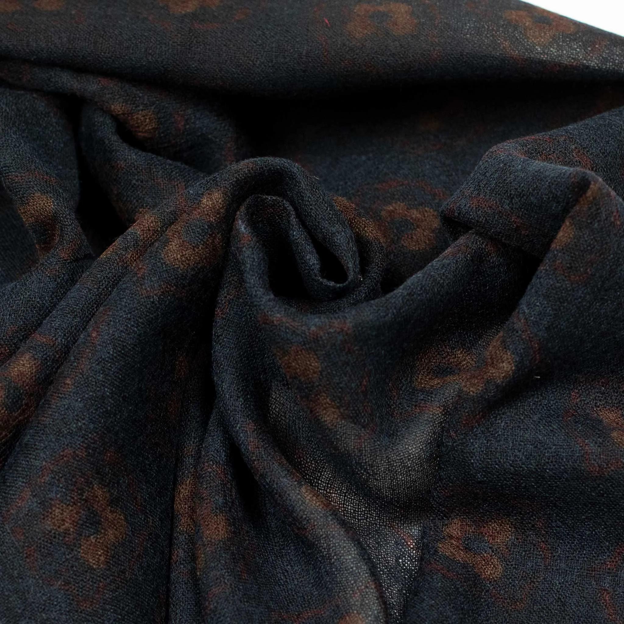 Printed wool stole in navy with subtle rust flower motifs